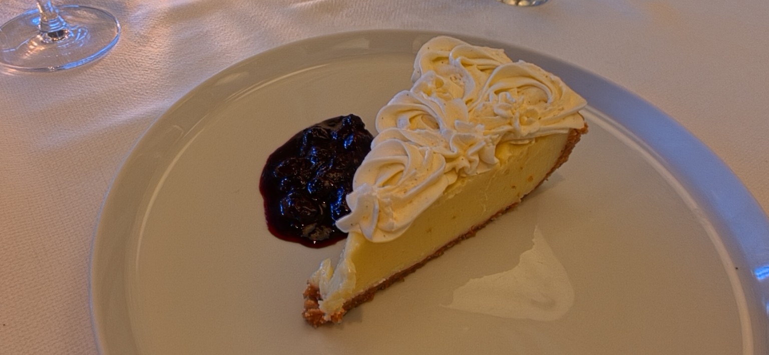 Key lime pie with whipped cream and blueberry compote at Henry's Palm Beach