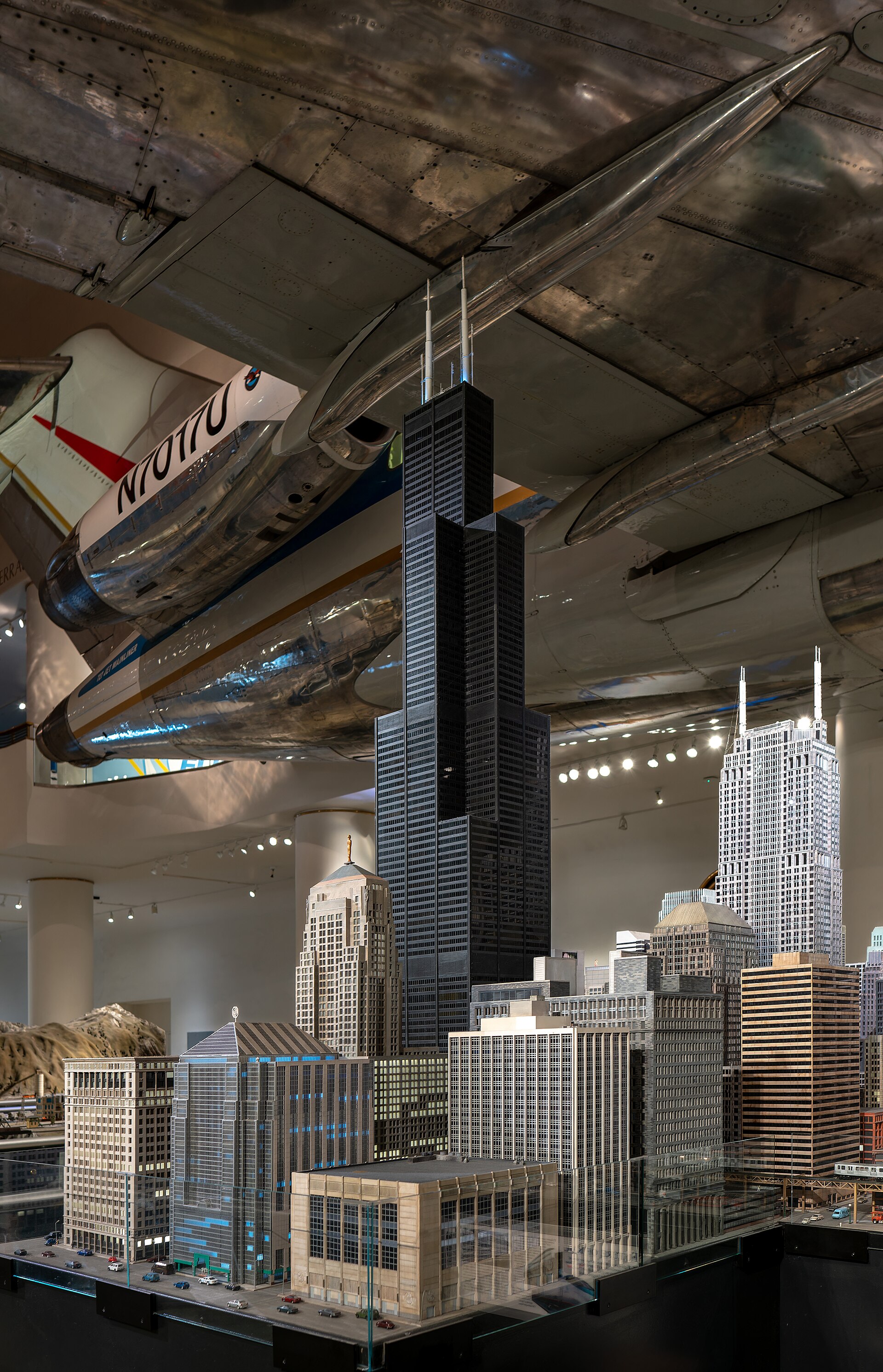 A Boeing 727 suspended above a detailed model of downtown Chicago in Griffin Museum