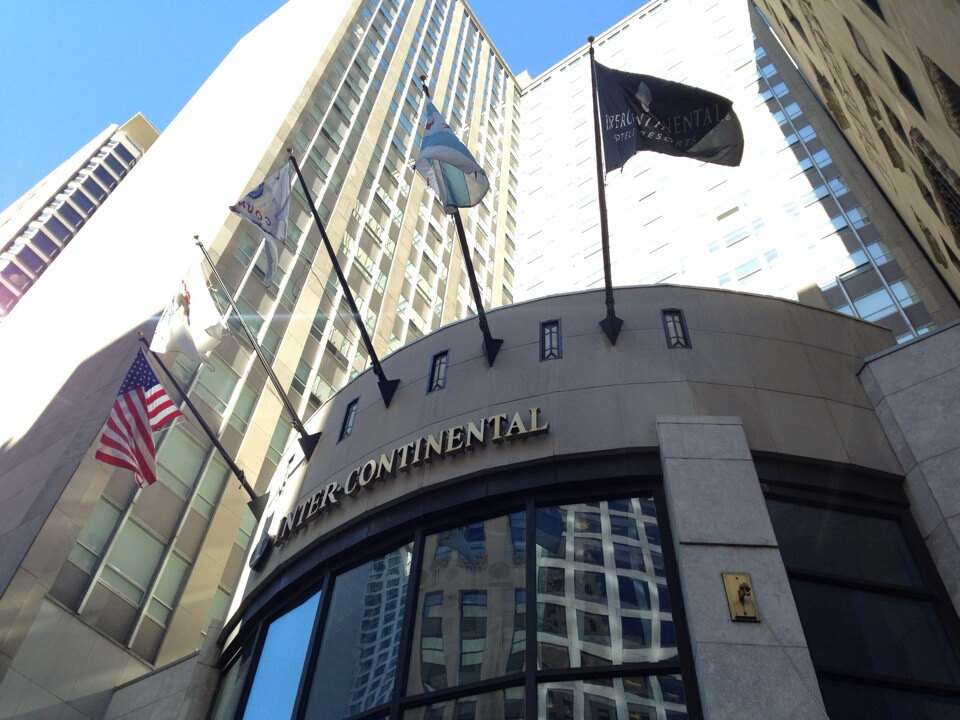 InterContinental Chicago Magnificent Mile entrance and hotel flags viewed from Michigan Avenue